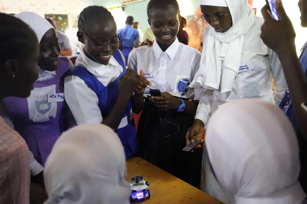Students with robotics